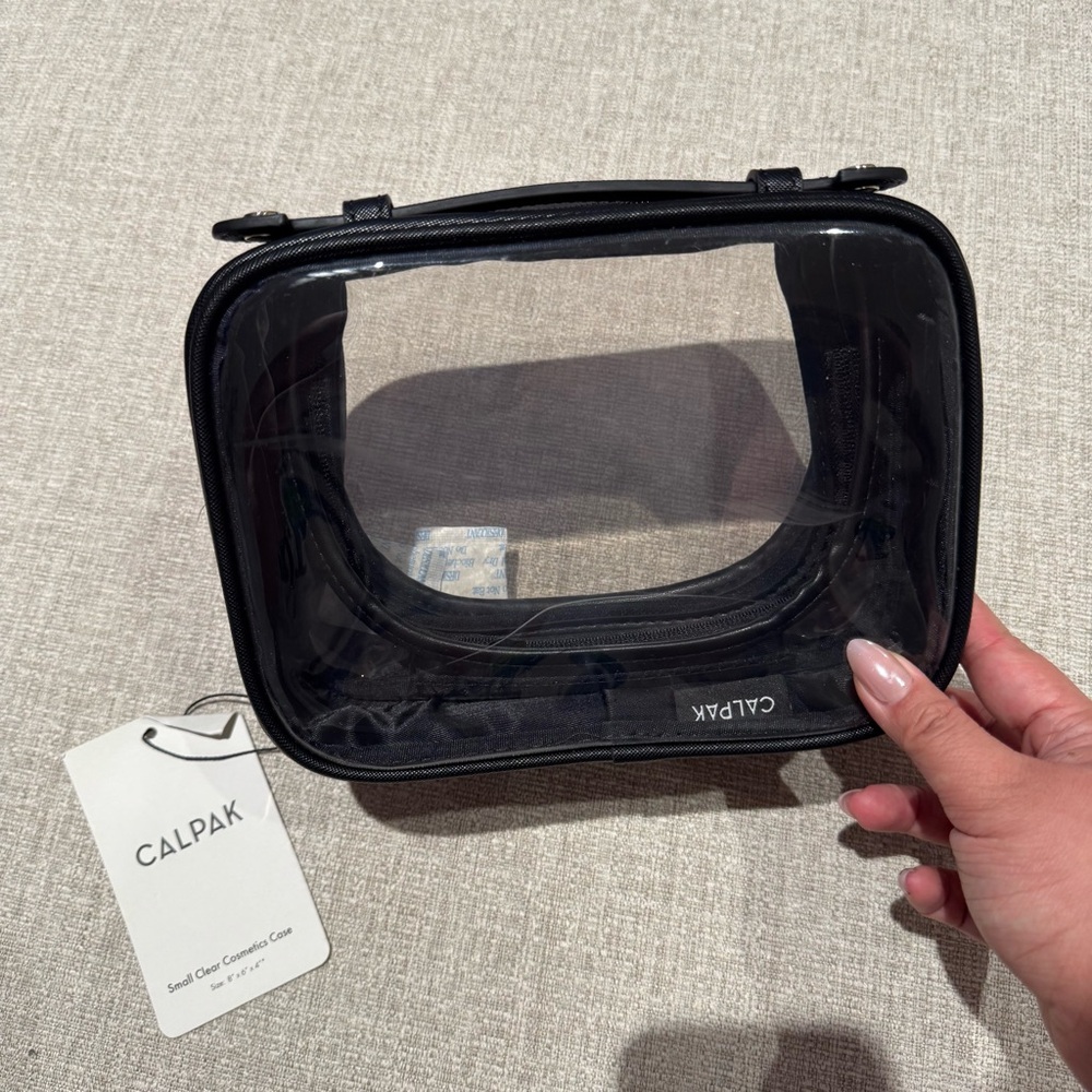 Calpak Small Clear Cosmetic Case in Black